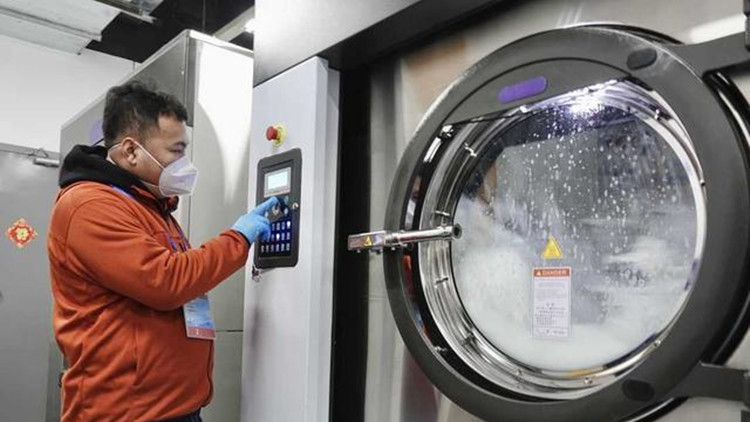 一台抵十台   「巨無霸」洗衣機 為冬奧冰球館提供服務