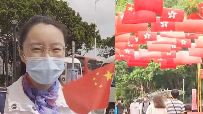有片丨香港街頭架設傳統花牌迎國慶 市民揮舞國旗送祝福