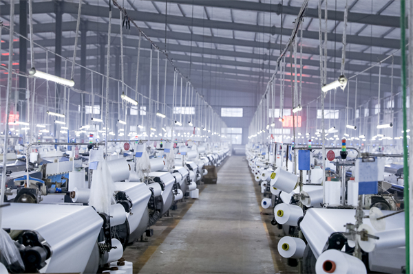 图三 万年聚润纺织生产车间.JPG