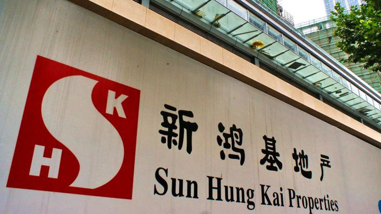 新地上半財年基礎溢利減少15%