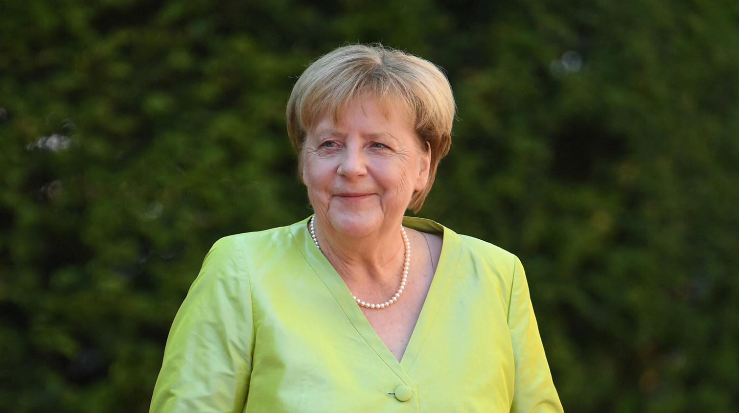 默克爾呼籲認真對待普京的話