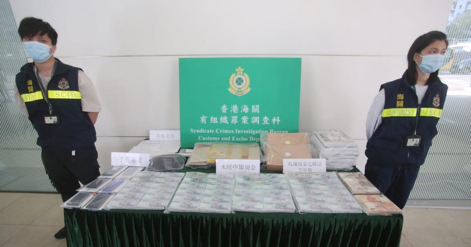兩外籍漢走私現金進港 海關緝獲逾百萬元外幣