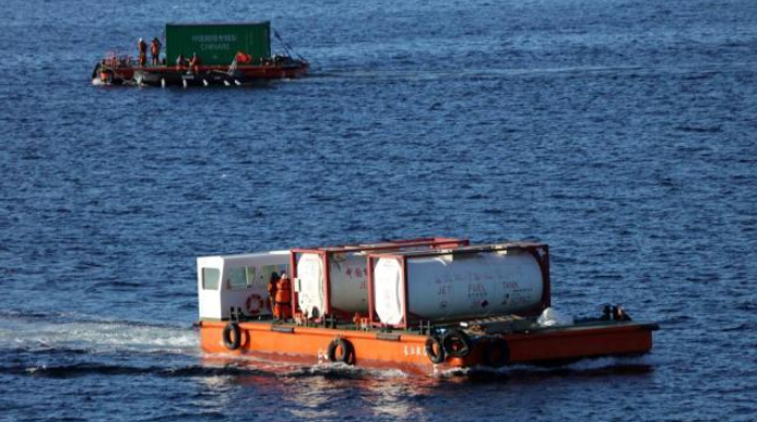 第42次南極考察｜「雪龍」號抵達秦嶺站開始卸貨