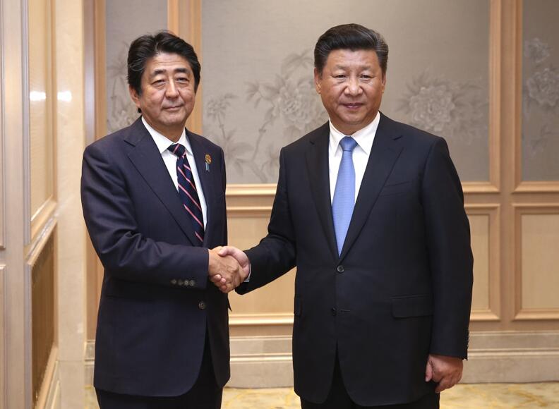 习近平劝安倍 南海问题谨言慎行